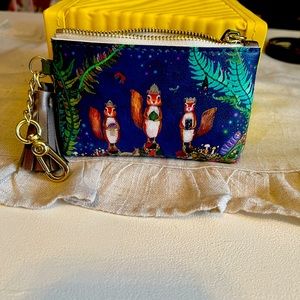 Green box zip around coin wallet with card slots and a key chain